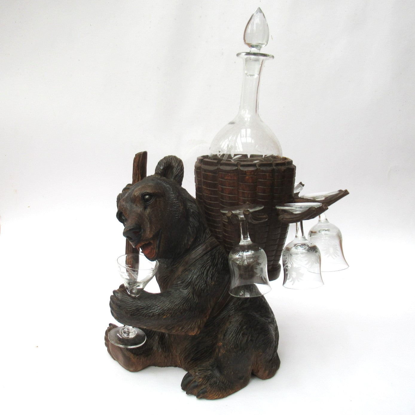 Antique Black Forest Swiss carved limewood bear liqueur set c1900