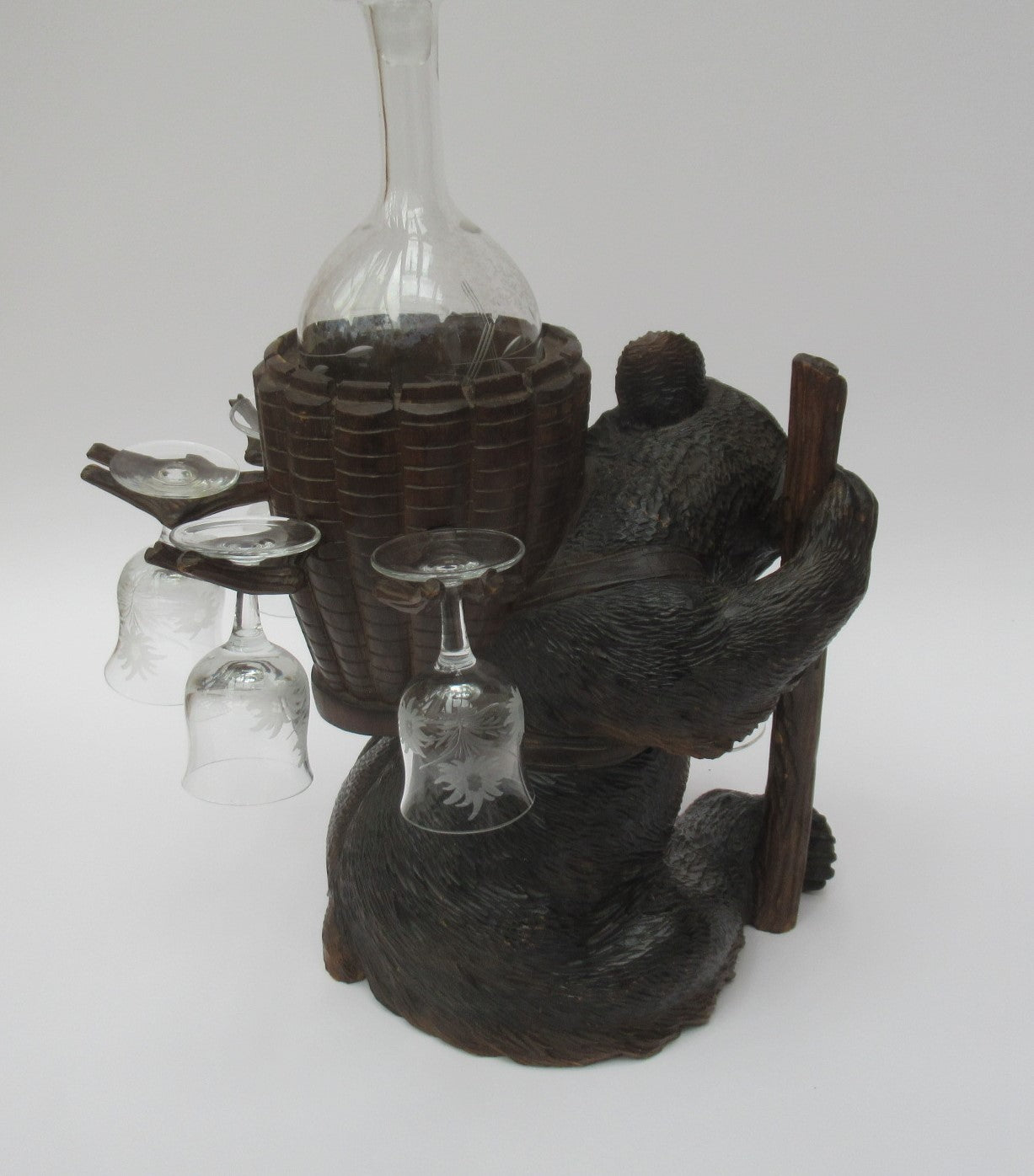 Antique Black Forest Swiss carved limewood bear liqueur set c1900