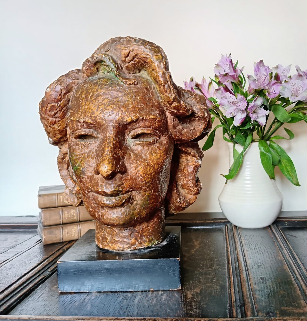 Valerie Clarebout RA, head of woman, patinated plaster, mid 20th century