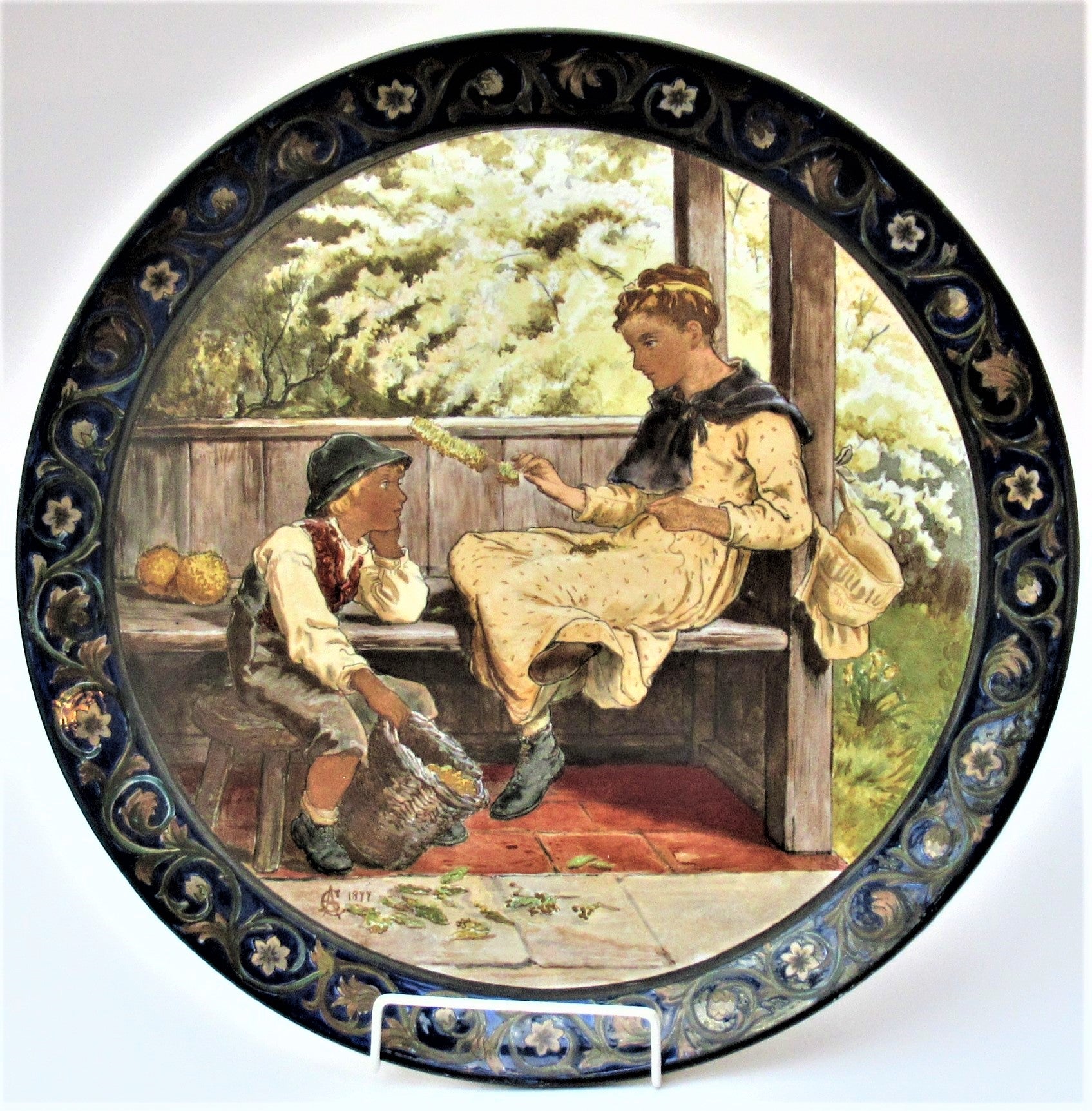 Large Arts and Crafts charger painted in 1877 by Catherine Sparkes, possibly for Doulton