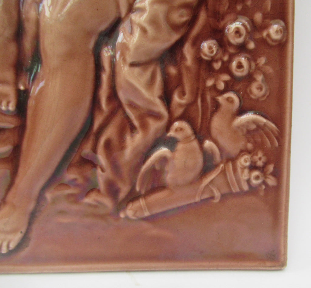 Antique 1901 Mintons 6 x 12 inch relief moulded majolica tile, Venus and Cupid
