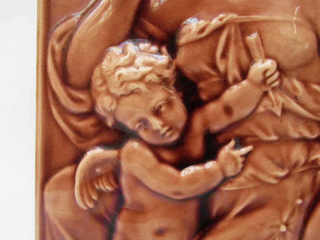 Antique 1901 Mintons 6 x 12 inch relief moulded majolica tile, Venus and Cupid
